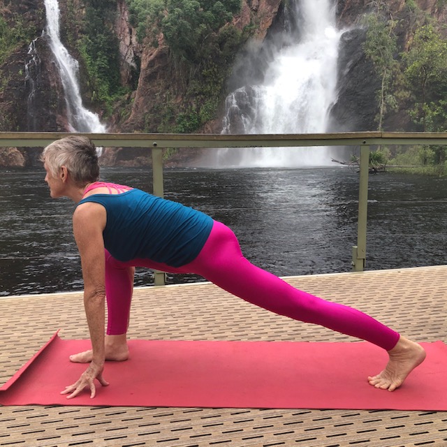 Lunge pose by Chris Lalor at Wangi falls