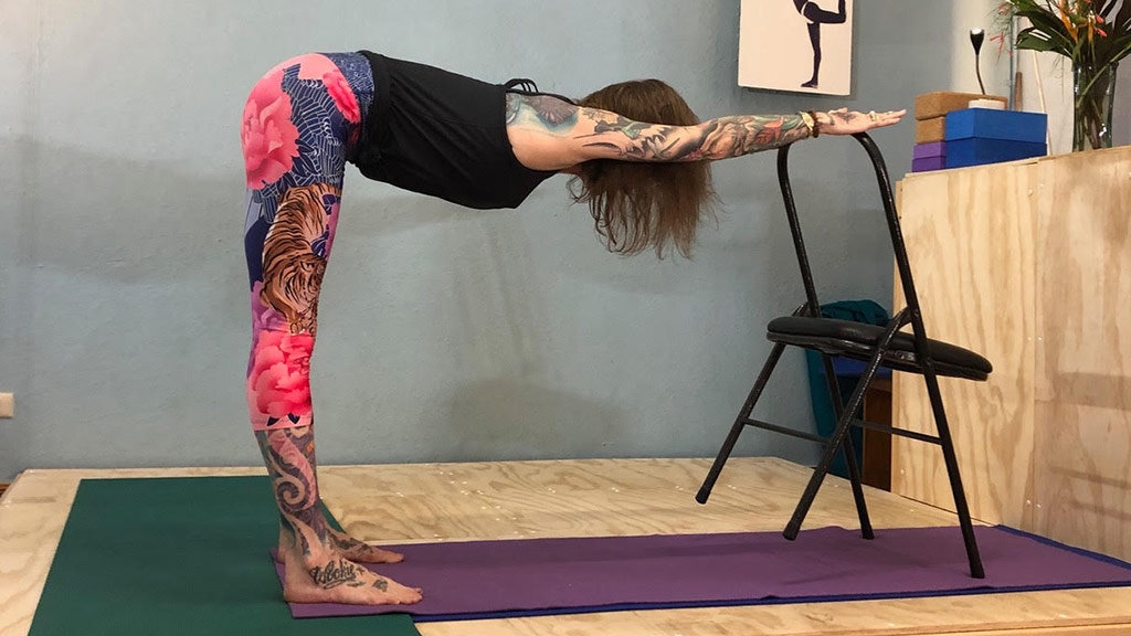 7 Yoga Moves to Relieve Back Pain - Camille Styles