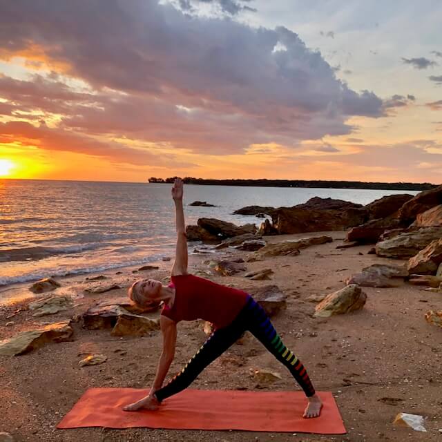 Woman in Yoga Pose on the Beach at Sunset, Religious Stock Footage