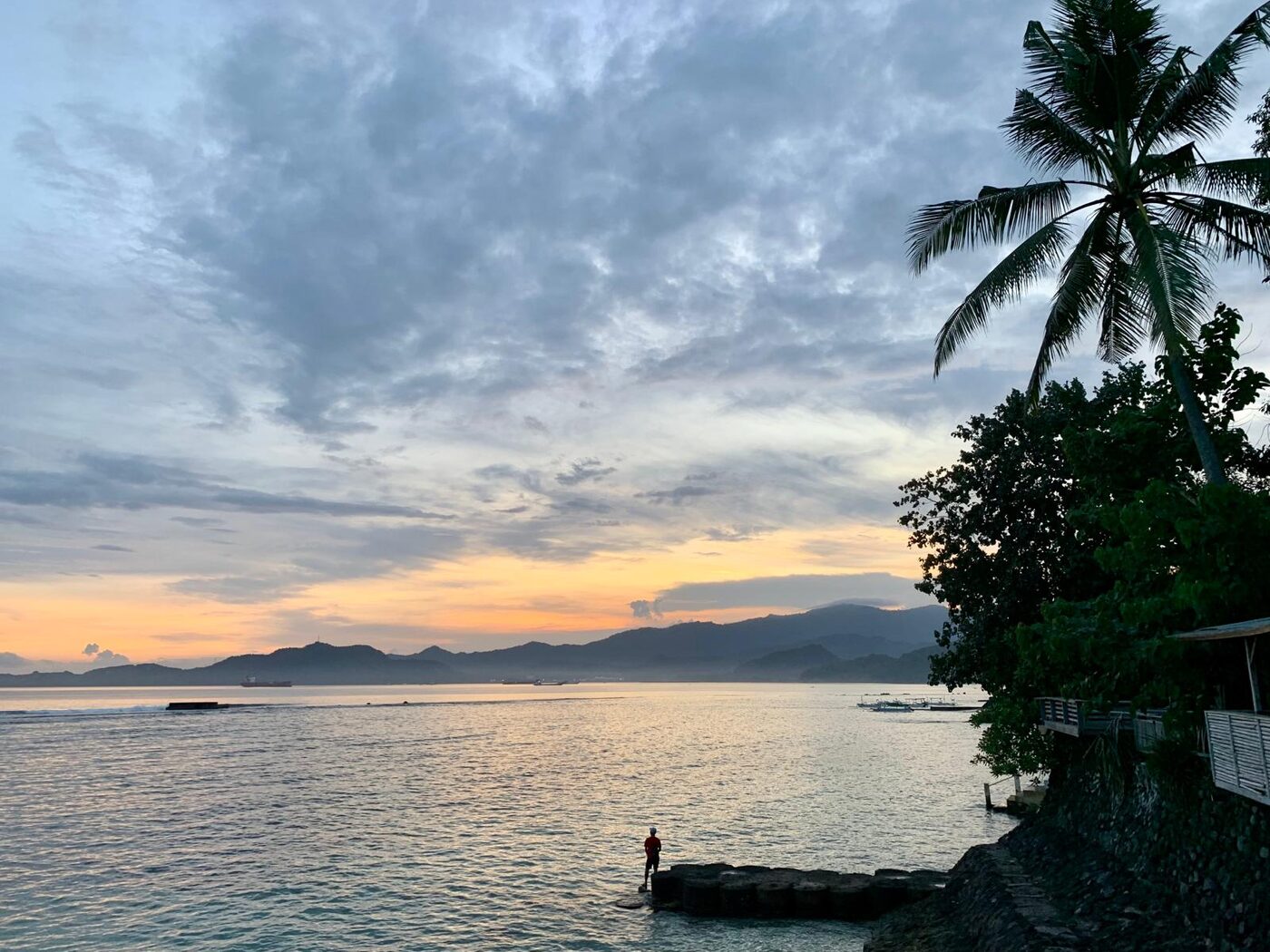 Sunset over the sea directly in front of the Flametree Bali retreat at Sengkidu, Candidasa