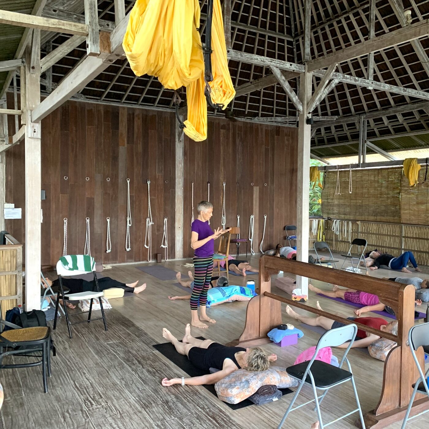 A yoga in progress in the upstairs Iyengar yoga room at Pondok Pisang, Bali