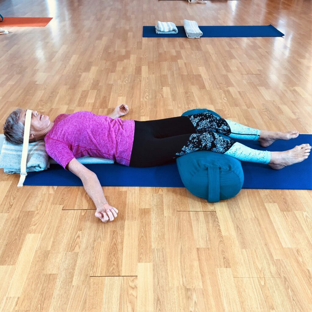 Breathing practice after breast cancer: lying over bolsters with an eye cover for pranayama