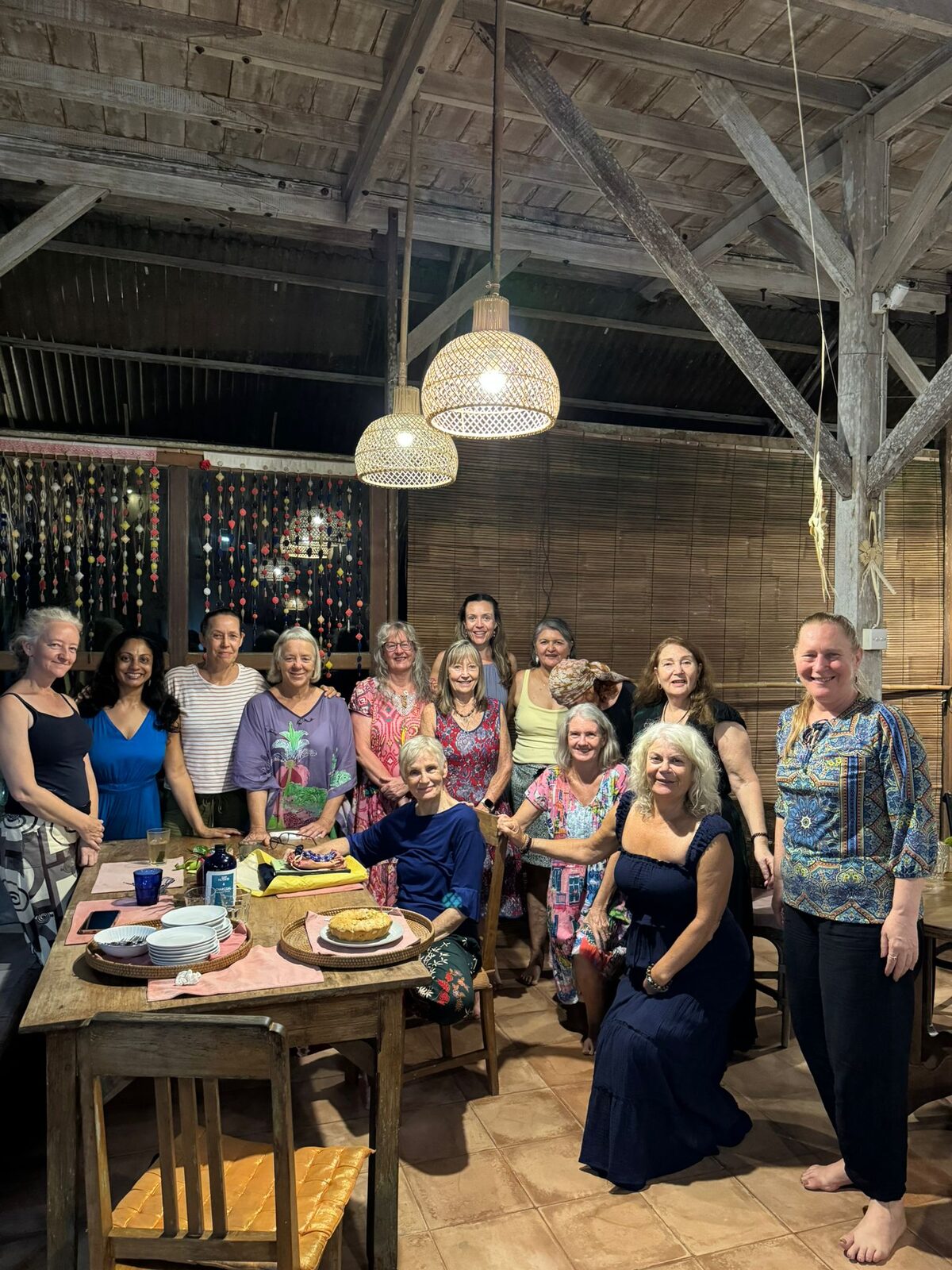 The Flametree retreat group together in the dining room on the last night of the Bali retreat