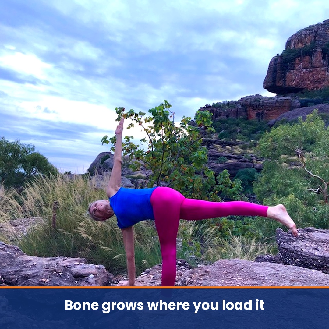 Balance test: Chris Lalor in Half Moon Pose on rock in the Northern Territory, standing leg straight