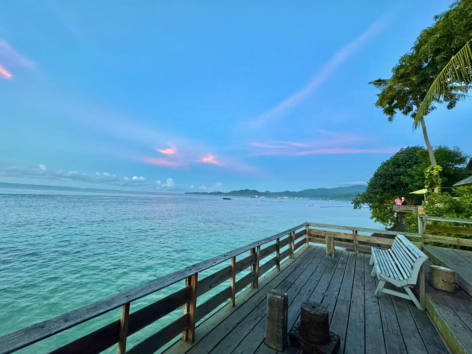 The wooden jetty over the water at Pondok Pisang, Candidasa, Bali
