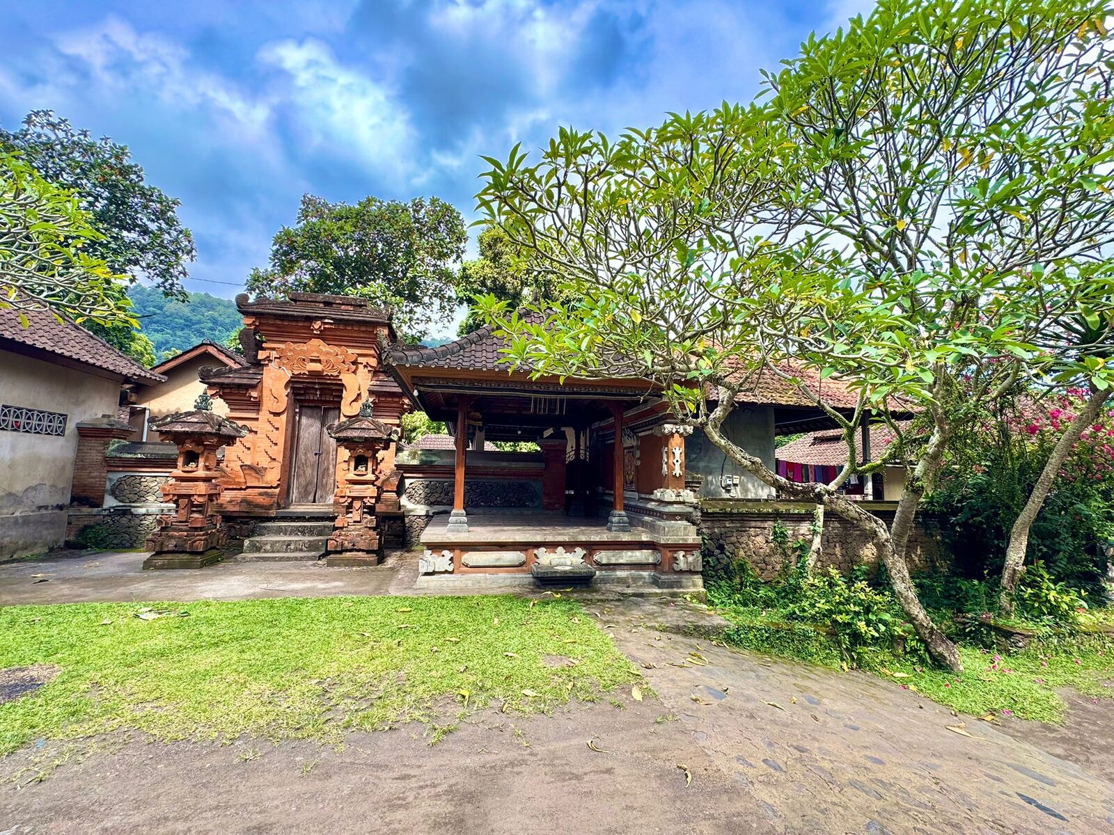 Family compound gateways along a lane in Tenganan traditional village, East Bali