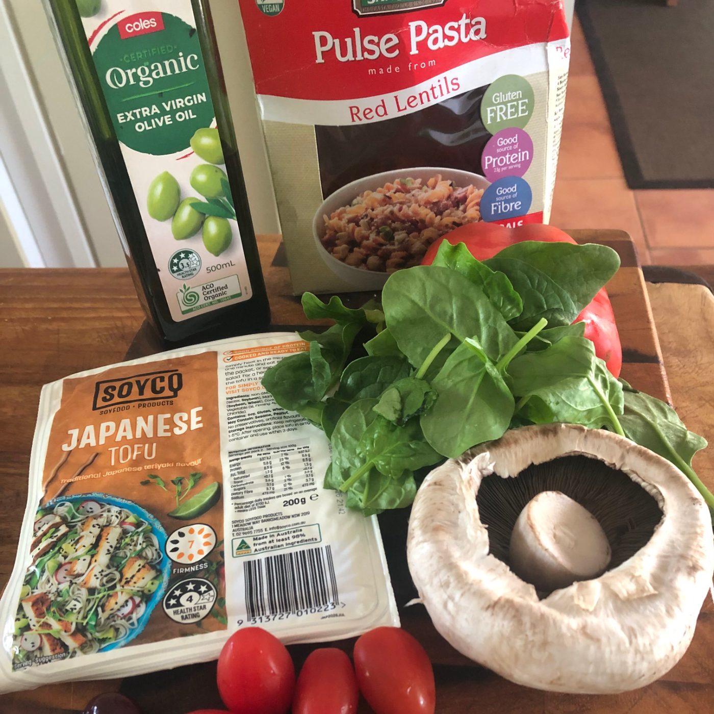 Lentil pasta, olive oil, tofu, baby spinach, mushroom and baby tomatoes