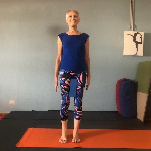 Why is my neck so stiff? Chris Lalor in Mountain Pose, chin level, shoulders back and down, in the studio